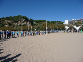 Flash mob circle on the beach